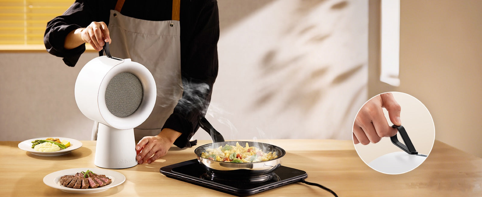 ハンドルで持ち運べるホワイトのAirHood 2